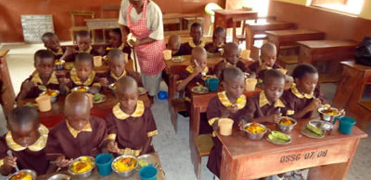 Primary school pupils having their meals. Photo: Punch