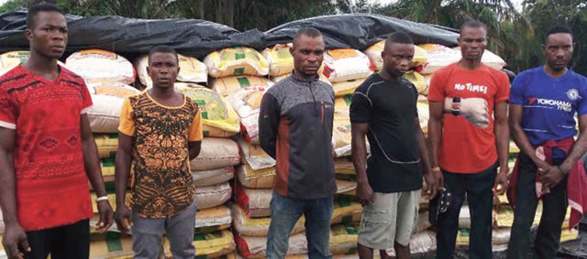Image result for Navy hands over contraband rice, suspects to Customs